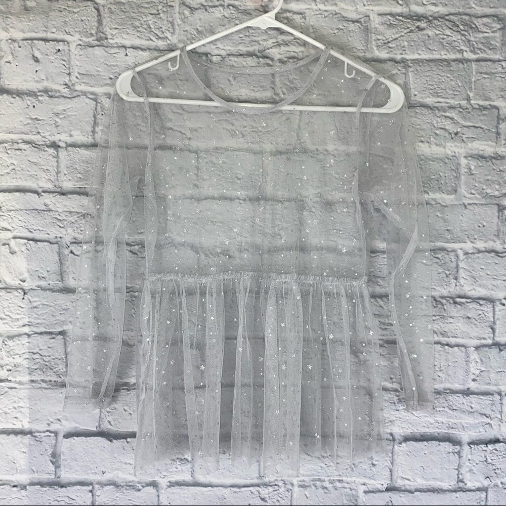 Girls white sheer ruffle bottom top w/stars 10-12